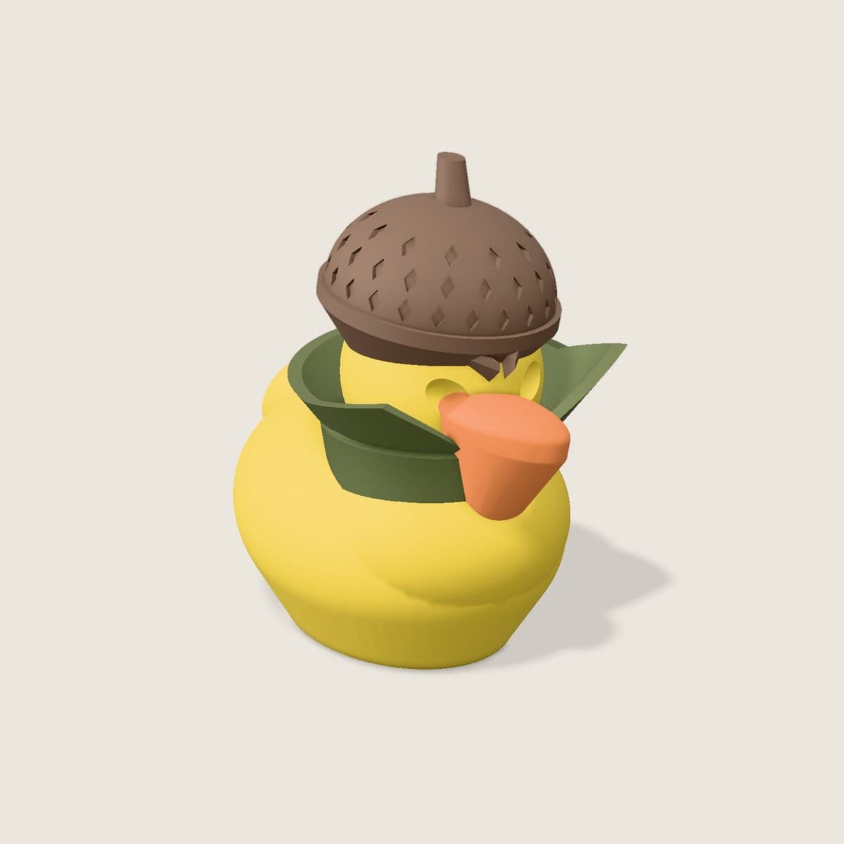 The OakenDuck skrått forfra i PLA Matte, gul med brun eikenøtthjelm, oransje nebb og grønn krage.